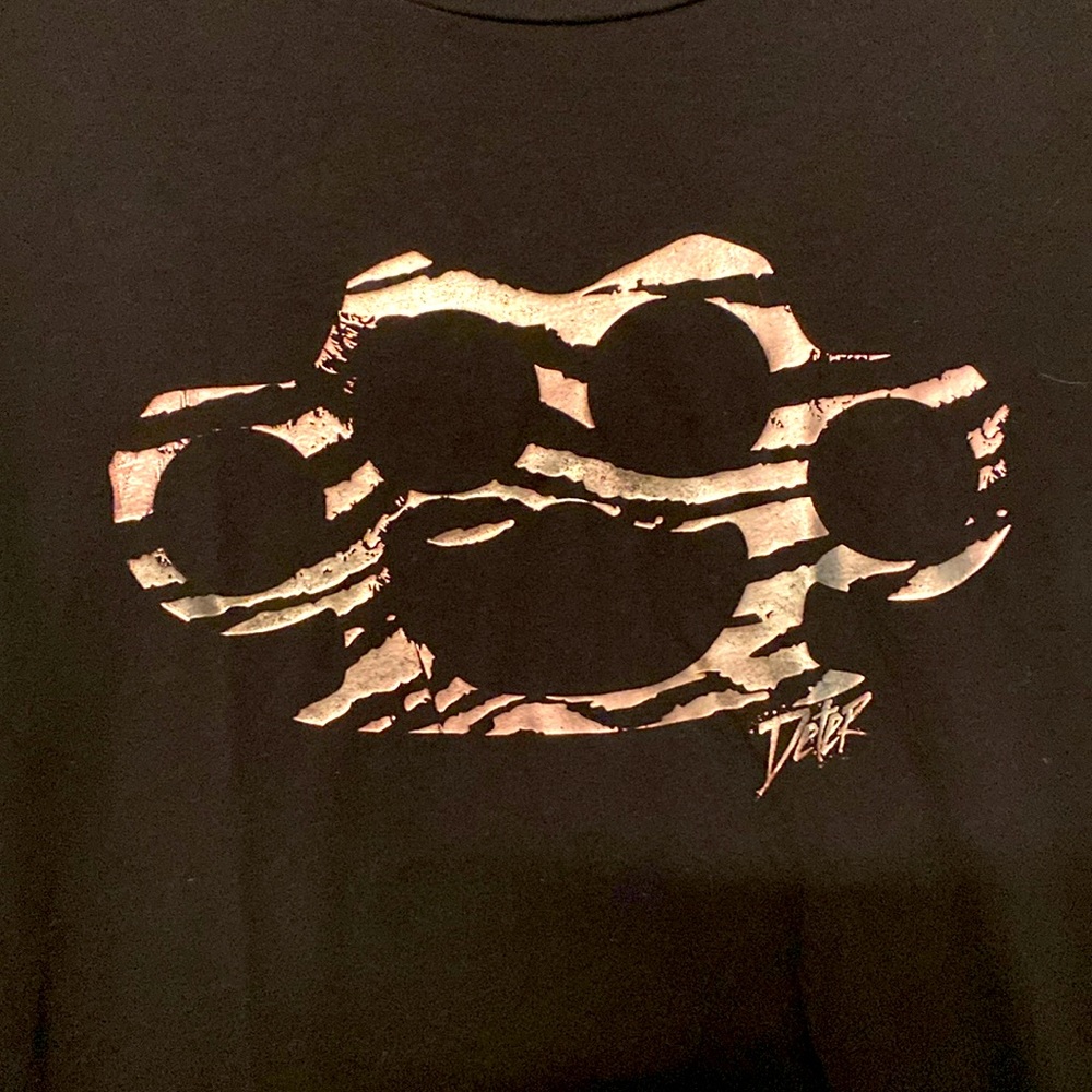 Juniors deter large brass knuckle shirt